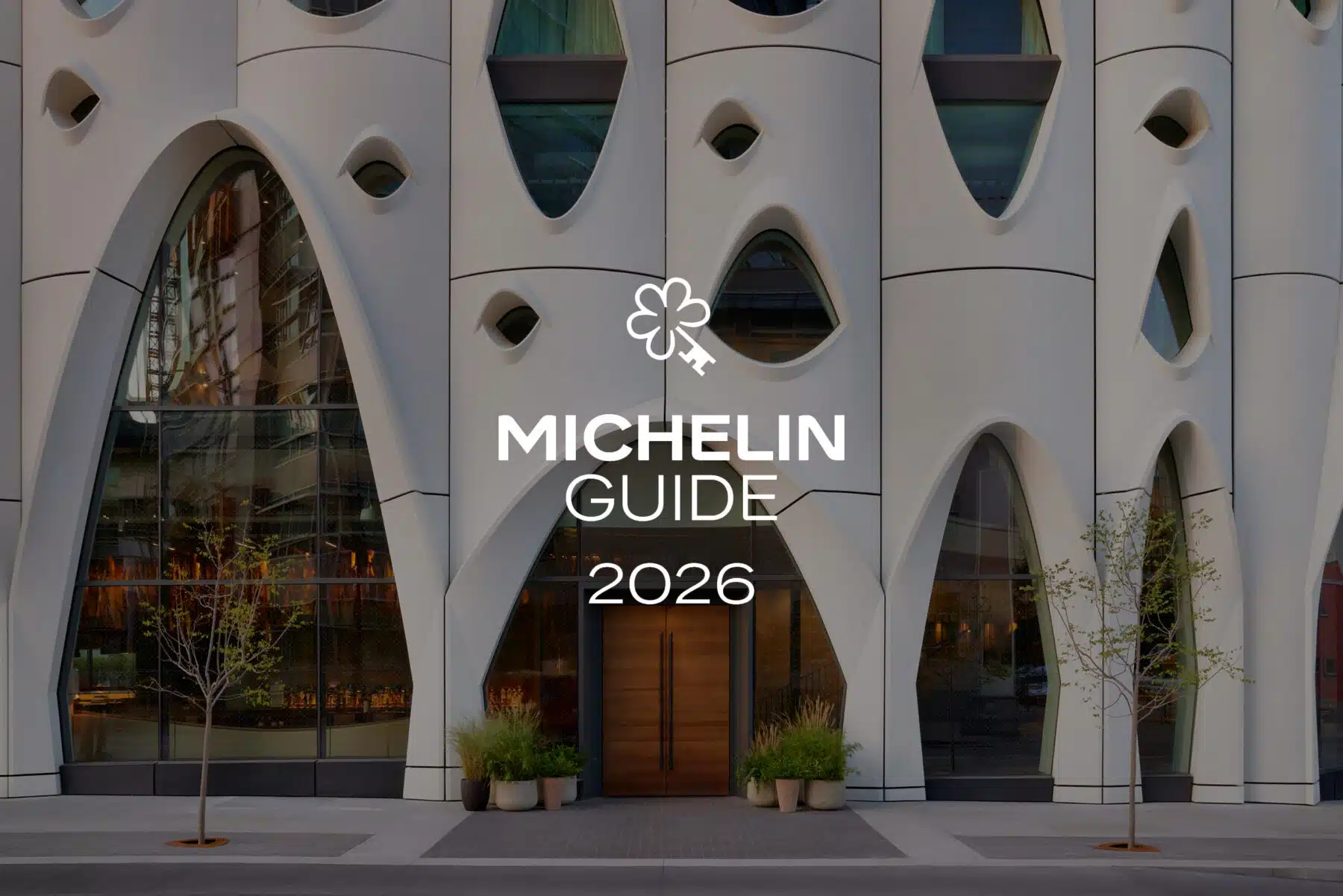 Exterior shot of the hotel entrance with MICHELIN Guide One Key 2026 logo overaly